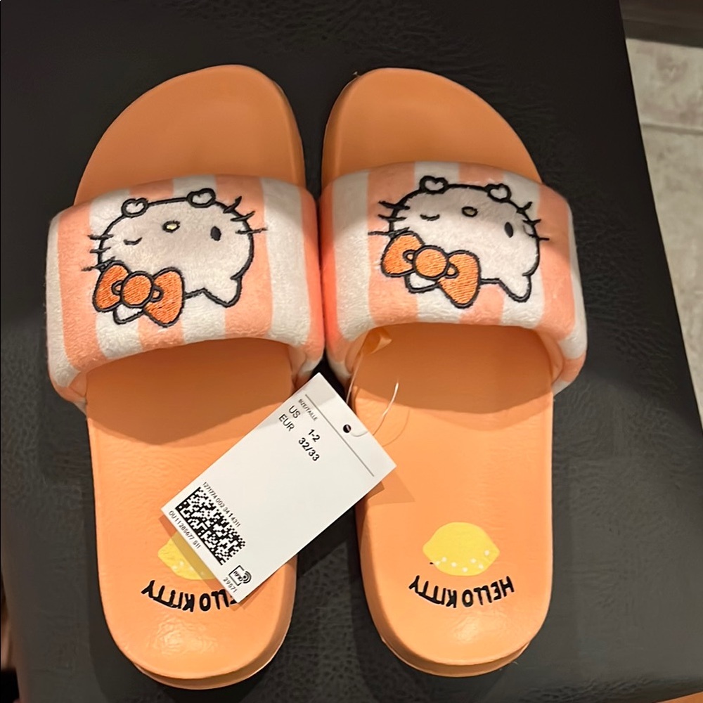H&M girls Hello Kitty Orange and White slides size 1-2